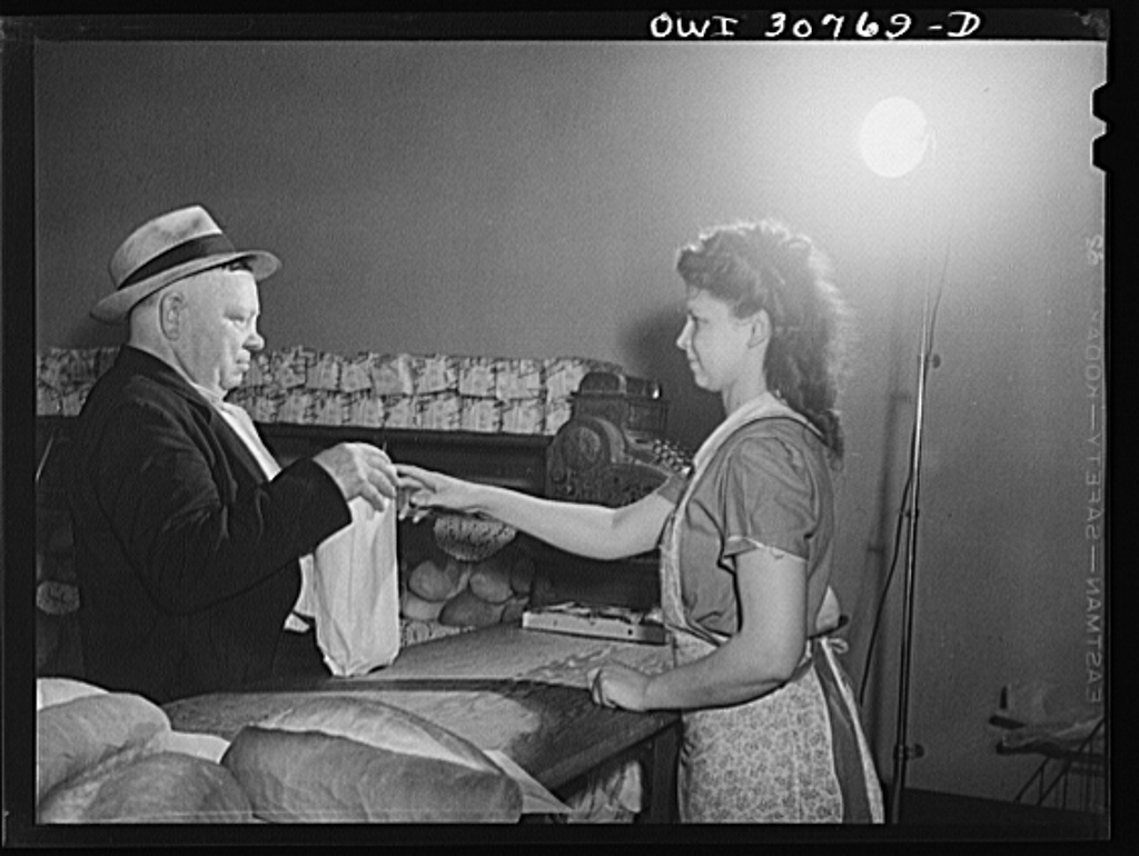 Purchasing bread in a Lithuanian bakery.8d19617v